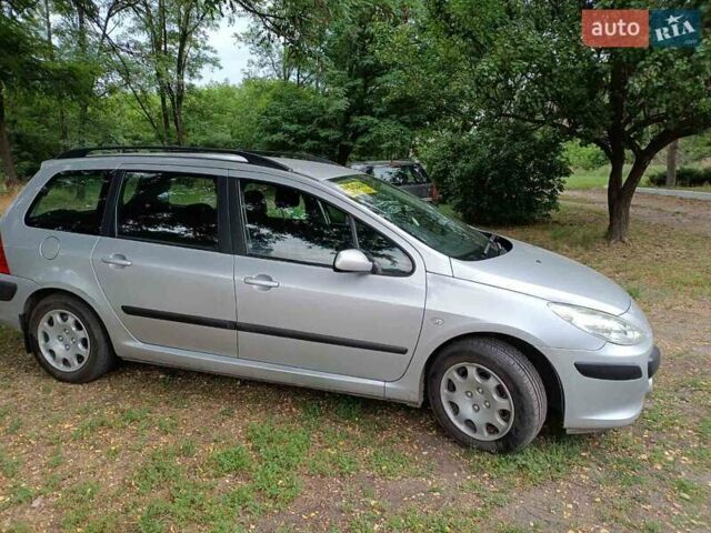 Серый Пежо 307, объемом двигателя 1.56 л и пробегом 286 тыс. км за 4500 $, фото 1 на Automoto.ua