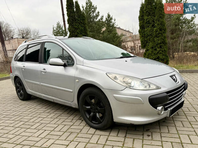 Серый Пежо 307, объемом двигателя 2 л и пробегом 210 тыс. км за 3950 $, фото 6 на Automoto.ua