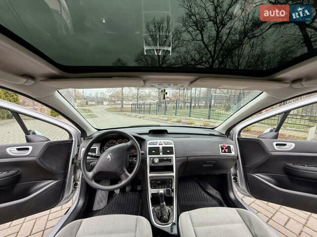 Серый Пежо 307, объемом двигателя 2 л и пробегом 210 тыс. км за 3950 $, фото 12 на Automoto.ua