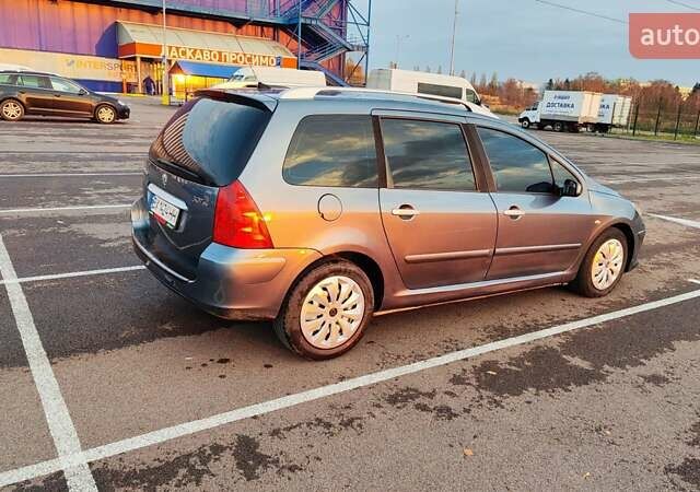 Серый Пежо 307, объемом двигателя 2 л и пробегом 365 тыс. км за 3900 $, фото 10 на Automoto.ua