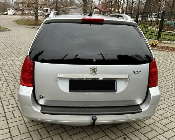 Серый Пежо 307, объемом двигателя 2 л и пробегом 210 тыс. км за 3950 $, фото 3 на Automoto.ua