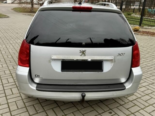 Серый Пежо 307, объемом двигателя 2 л и пробегом 210 тыс. км за 3950 $, фото 3 на Automoto.ua
