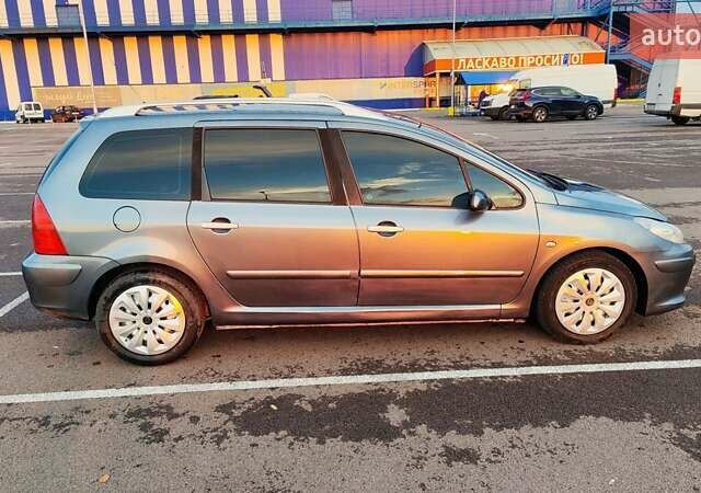 Серый Пежо 307, объемом двигателя 2 л и пробегом 365 тыс. км за 3900 $, фото 1 на Automoto.ua