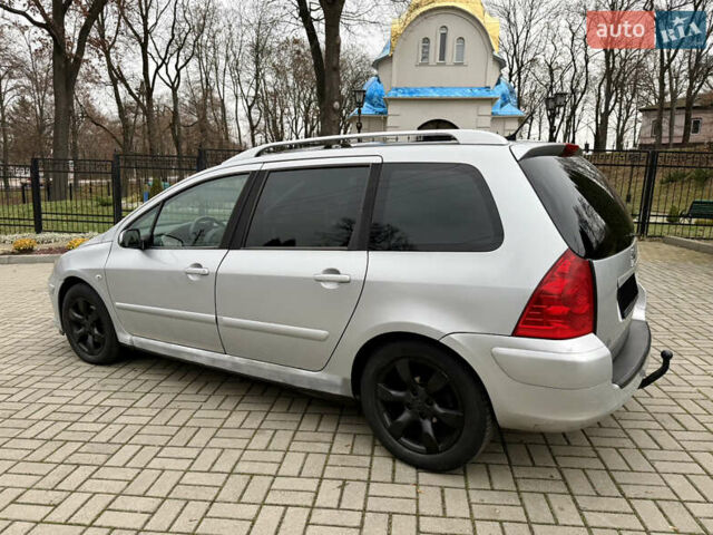 Серый Пежо 307, объемом двигателя 2 л и пробегом 210 тыс. км за 3950 $, фото 2 на Automoto.ua