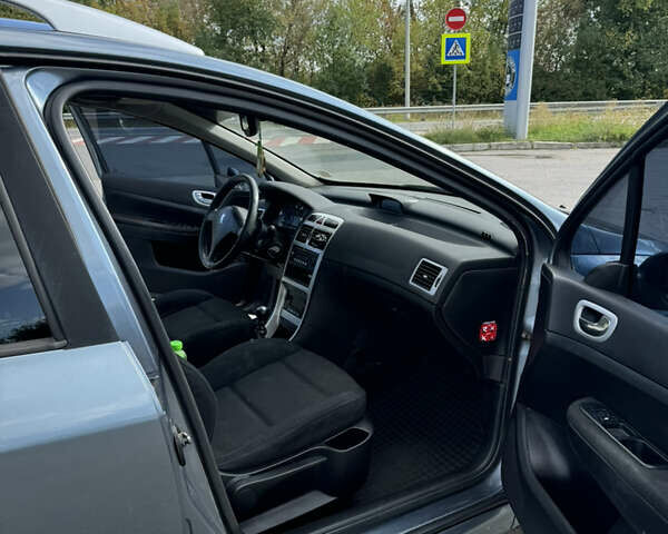 Серый Пежо 307, объемом двигателя 2 л и пробегом 340 тыс. км за 2900 $, фото 10 на Automoto.ua
