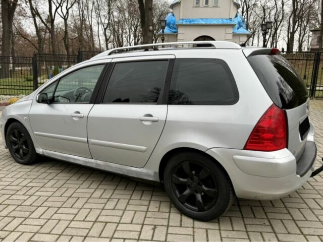 Серый Пежо 307, объемом двигателя 2 л и пробегом 210 тыс. км за 3950 $, фото 4 на Automoto.ua