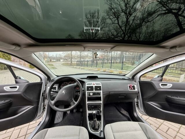 Серый Пежо 307, объемом двигателя 2 л и пробегом 210 тыс. км за 3950 $, фото 8 на Automoto.ua