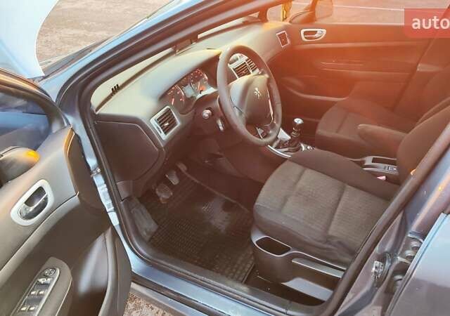 Серый Пежо 307, объемом двигателя 2 л и пробегом 365 тыс. км за 3900 $, фото 4 на Automoto.ua