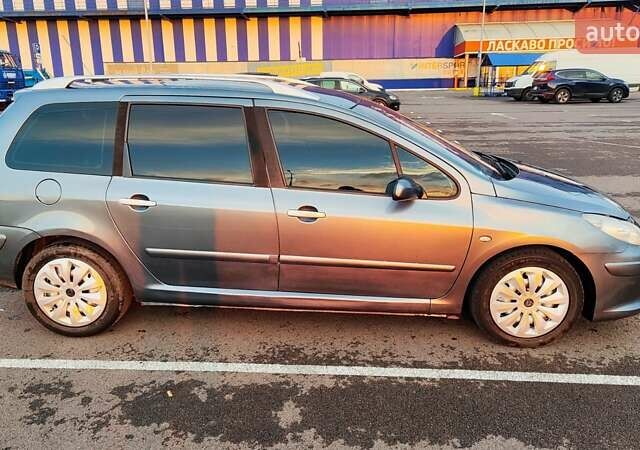 Серый Пежо 307, объемом двигателя 2 л и пробегом 365 тыс. км за 3900 $, фото 3 на Automoto.ua