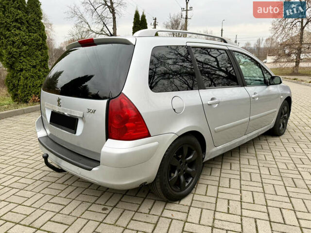 Серый Пежо 307, объемом двигателя 2 л и пробегом 210 тыс. км за 3950 $, фото 4 на Automoto.ua