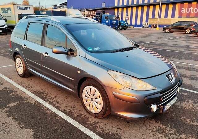 Серый Пежо 307, объемом двигателя 2 л и пробегом 365 тыс. км за 3900 $, фото 8 на Automoto.ua