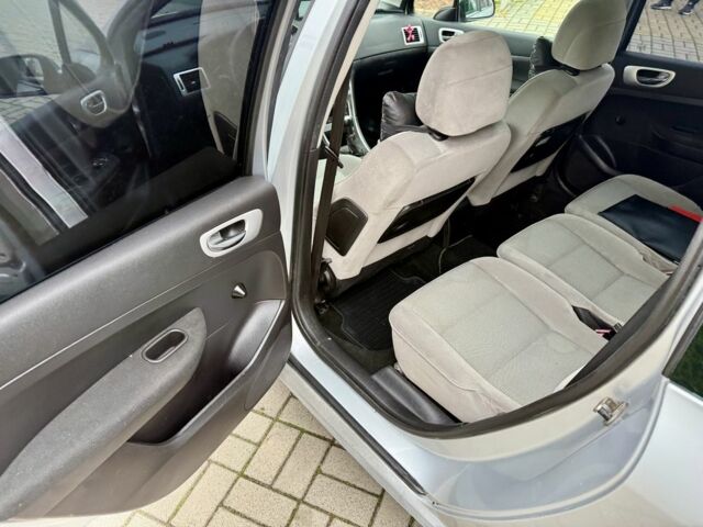 Серый Пежо 307, объемом двигателя 2 л и пробегом 210 тыс. км за 3950 $, фото 13 на Automoto.ua