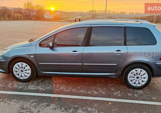 Серый Пежо 307, объемом двигателя 2 л и пробегом 365 тыс. км за 3900 $, фото 5 на Automoto.ua