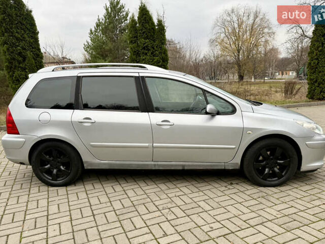 Серый Пежо 307, объемом двигателя 2 л и пробегом 210 тыс. км за 3950 $, фото 5 на Automoto.ua