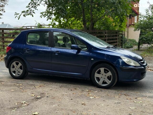 Синий Пежо 307, объемом двигателя 2 л и пробегом 296 тыс. км за 3590 $, фото 3 на Automoto.ua