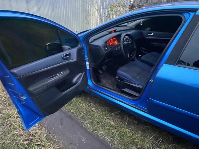 Синий Пежо 307, объемом двигателя 1.4 л и пробегом 286 тыс. км за 1950 $, фото 9 на Automoto.ua