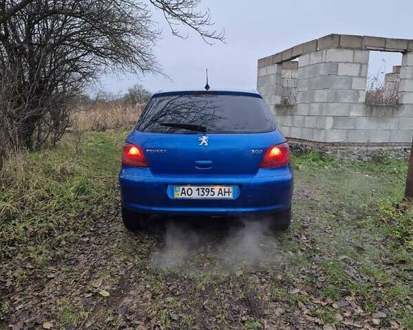 Синий Пежо 307, объемом двигателя 1.4 л и пробегом 286 тыс. км за 1950 $, фото 4 на Automoto.ua