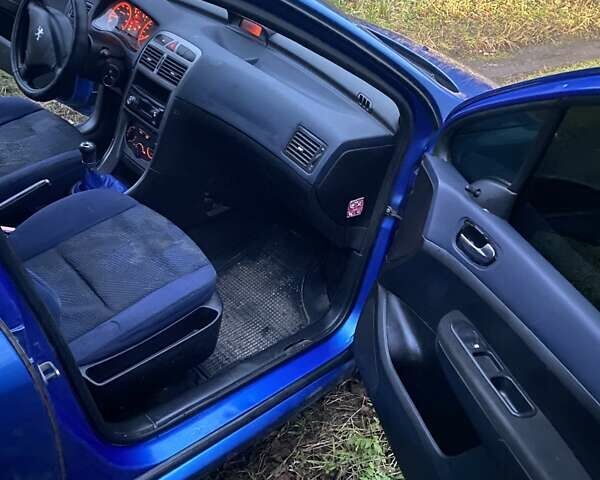 Синий Пежо 307, объемом двигателя 1.4 л и пробегом 286 тыс. км за 1950 $, фото 12 на Automoto.ua