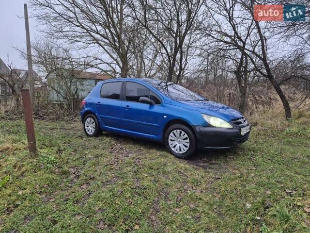 Синий Пежо 307, объемом двигателя 1.4 л и пробегом 286 тыс. км за 1950 $, фото 1 на Automoto.ua