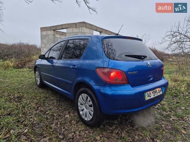 Синий Пежо 307, объемом двигателя 1.4 л и пробегом 286 тыс. км за 1950 $, фото 2 на Automoto.ua