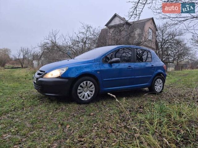 Синий Пежо 307, объемом двигателя 1.4 л и пробегом 286 тыс. км за 1950 $, фото 3 на Automoto.ua