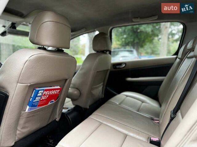 Синий Пежо 307, объемом двигателя 2 л и пробегом 296 тыс. км за 3590 $, фото 16 на Automoto.ua