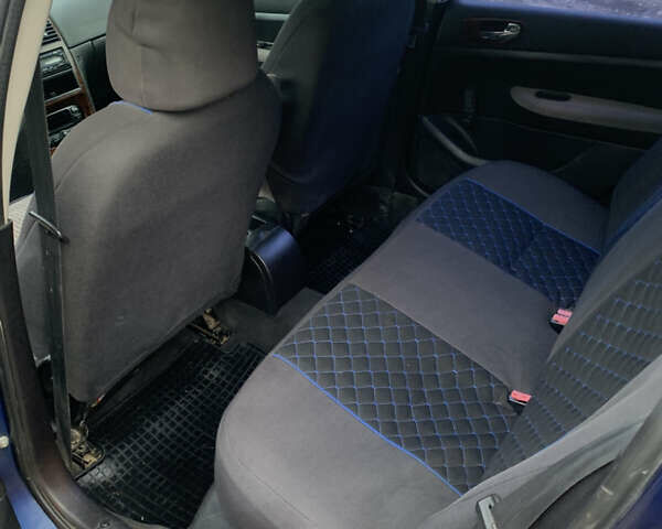 Синий Пежо 307, объемом двигателя 2 л и пробегом 260 тыс. км за 3750 $, фото 6 на Automoto.ua