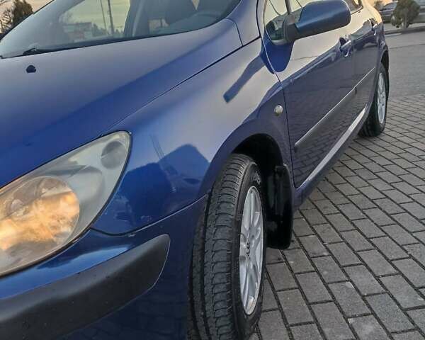 Синий Пежо 307, объемом двигателя 1.4 л и пробегом 262 тыс. км за 3000 $, фото 1 на Automoto.ua