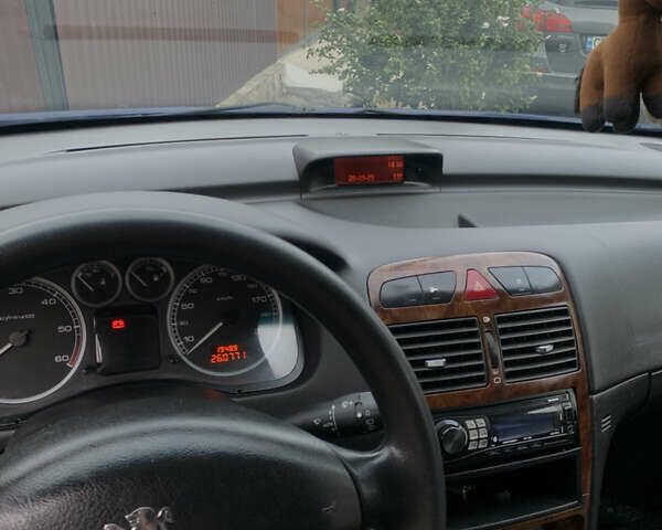 Синий Пежо 307, объемом двигателя 2 л и пробегом 260 тыс. км за 3750 $, фото 8 на Automoto.ua
