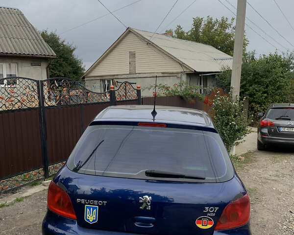 Синий Пежо 307, объемом двигателя 2 л и пробегом 260 тыс. км за 3750 $, фото 1 на Automoto.ua