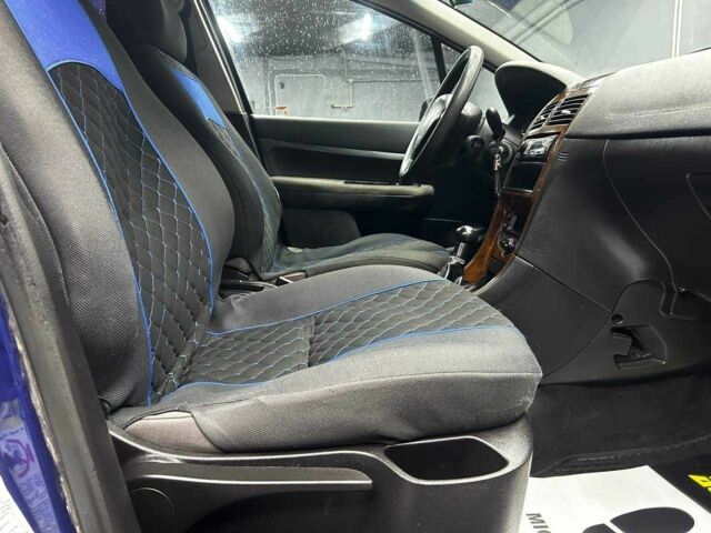 Синий Пежо 307, объемом двигателя 2 л и пробегом 260 тыс. км за 3900 $, фото 18 на Automoto.ua
