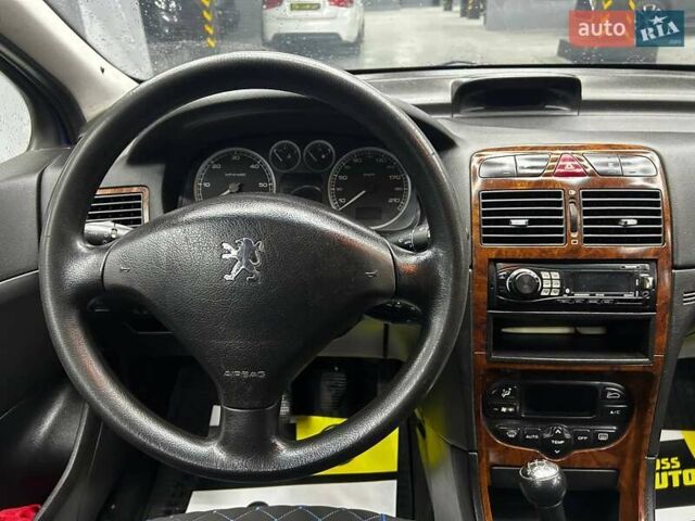 Синій Пежо 307, об'ємом двигуна 2 л та пробігом 260 тис. км за 3900 $, фото 9 на Automoto.ua