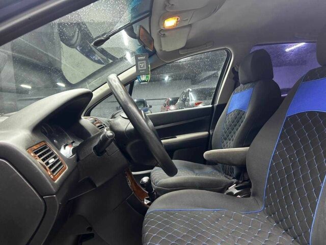 Синий Пежо 307, объемом двигателя 2 л и пробегом 260 тыс. км за 3900 $, фото 6 на Automoto.ua