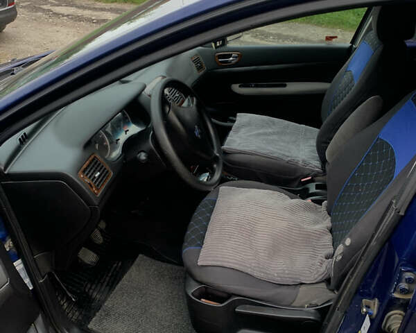 Синий Пежо 307, объемом двигателя 2 л и пробегом 260 тыс. км за 3750 $, фото 5 на Automoto.ua