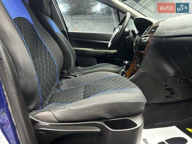 Синій Пежо 307, об'ємом двигуна 2 л та пробігом 260 тис. км за 3900 $, фото 18 на Automoto.ua