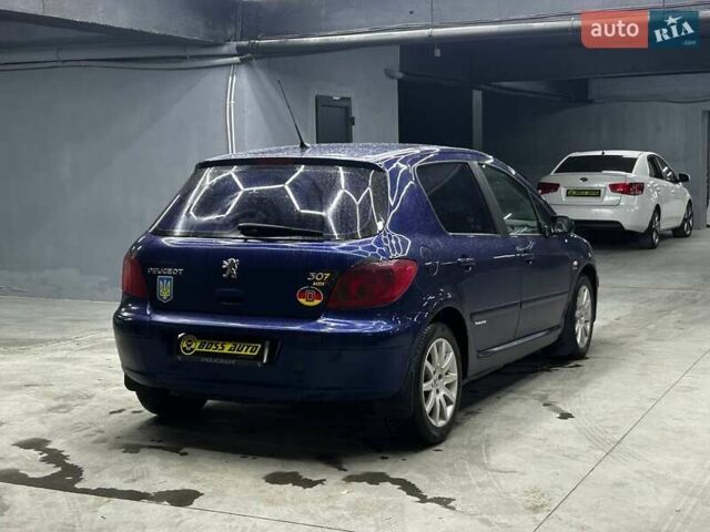 Синій Пежо 307, об'ємом двигуна 2 л та пробігом 260 тис. км за 3900 $, фото 5 на Automoto.ua