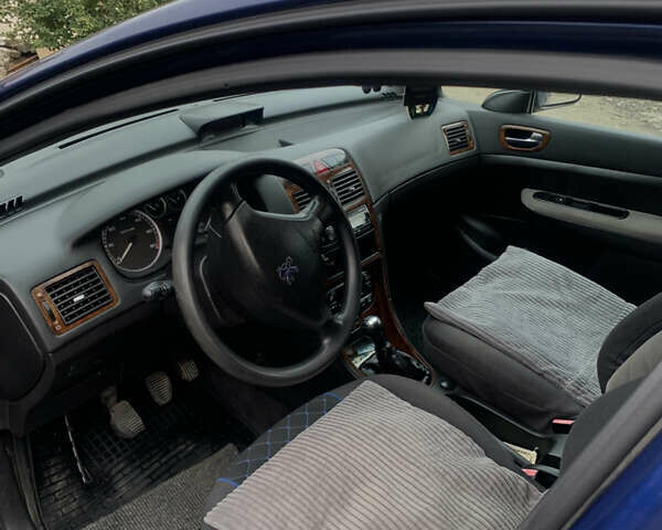 Синий Пежо 307, объемом двигателя 2 л и пробегом 260 тыс. км за 3750 $, фото 4 на Automoto.ua