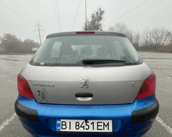 Синий Пежо 307, объемом двигателя 2 л и пробегом 168 тыс. км за 4000 $, фото 5 на Automoto.ua