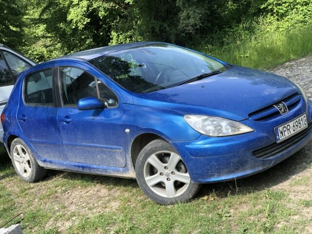 Синий Пежо 307, объемом двигателя 2 л и пробегом 300 тыс. км за 1450 $, фото 1 на Automoto.ua