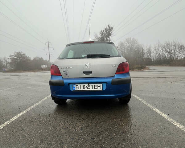 Синий Пежо 307, объемом двигателя 2 л и пробегом 168 тыс. км за 4000 $, фото 4 на Automoto.ua
