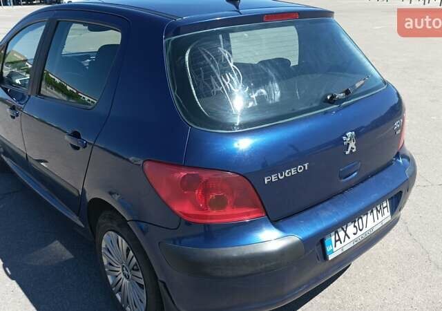 Синій Пежо 307, об'ємом двигуна 2 л та пробігом 430 тис. км за 3400 $, фото 6 на Automoto.ua