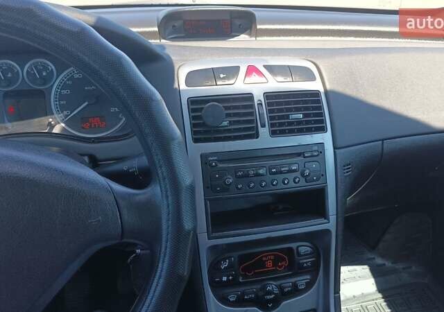 Синій Пежо 307, об'ємом двигуна 2 л та пробігом 430 тис. км за 3400 $, фото 11 на Automoto.ua