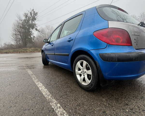 Синий Пежо 307, объемом двигателя 2 л и пробегом 168 тыс. км за 4000 $, фото 6 на Automoto.ua