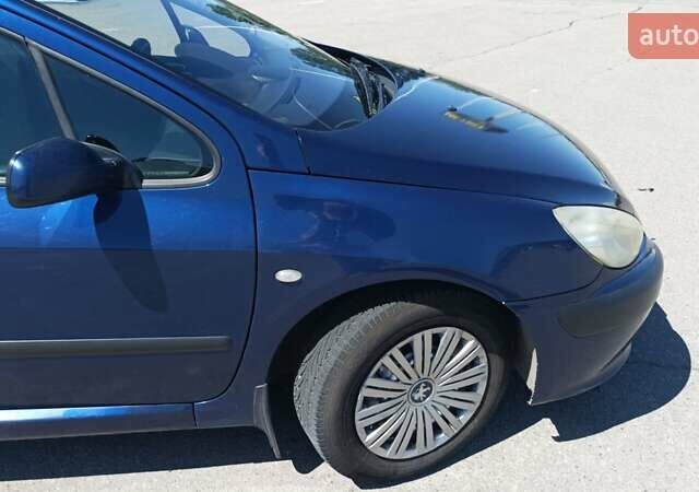 Синій Пежо 307, об'ємом двигуна 2 л та пробігом 430 тис. км за 3400 $, фото 5 на Automoto.ua