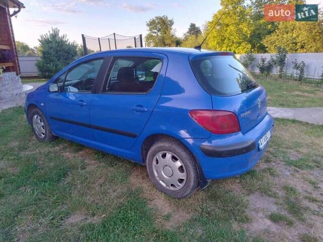 Синий Пежо 307, объемом двигателя 1.59 л и пробегом 310 тыс. км за 3500 $, фото 1 на Automoto.ua