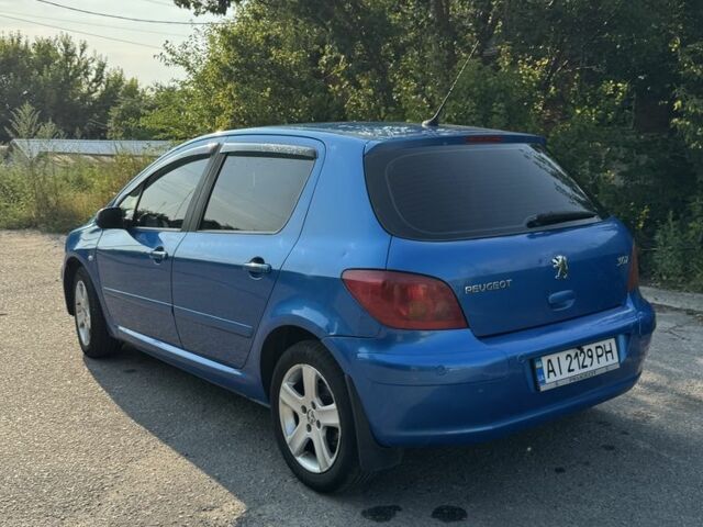 Синий Пежо 307, объемом двигателя 2 л и пробегом 235 тыс. км за 3900 $, фото 3 на Automoto.ua