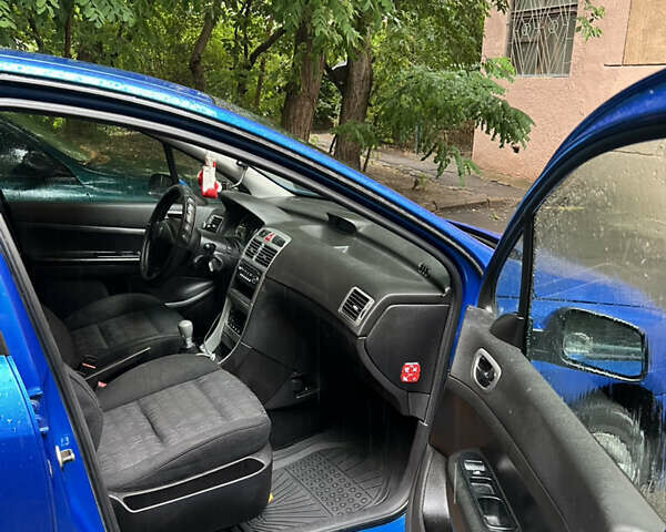 Синий Пежо 307, объемом двигателя 2 л и пробегом 260 тыс. км за 3800 $, фото 5 на Automoto.ua