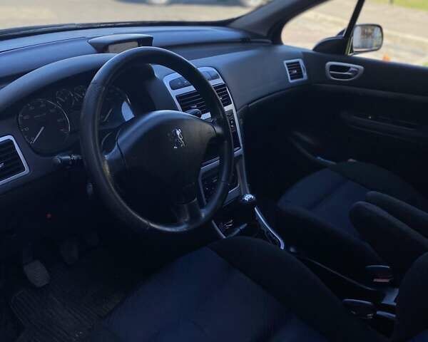 Синий Пежо 307, объемом двигателя 2 л и пробегом 245 тыс. км за 4000 $, фото 8 на Automoto.ua