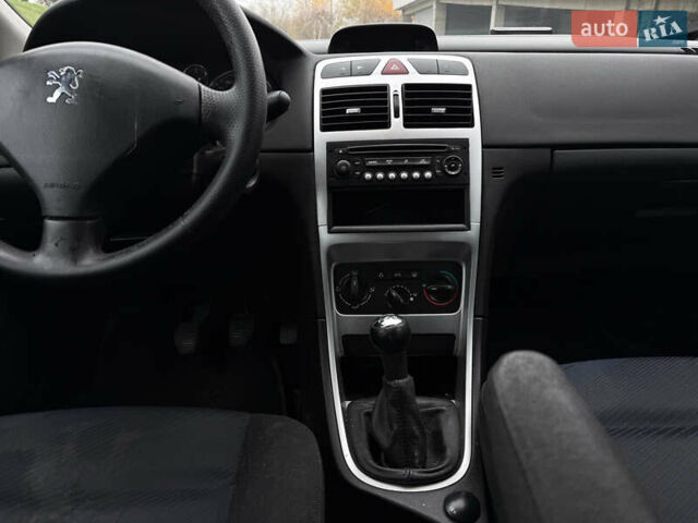 Синій Пежо 307, об'ємом двигуна 2 л та пробігом 208 тис. км за 3300 $, фото 17 на Automoto.ua