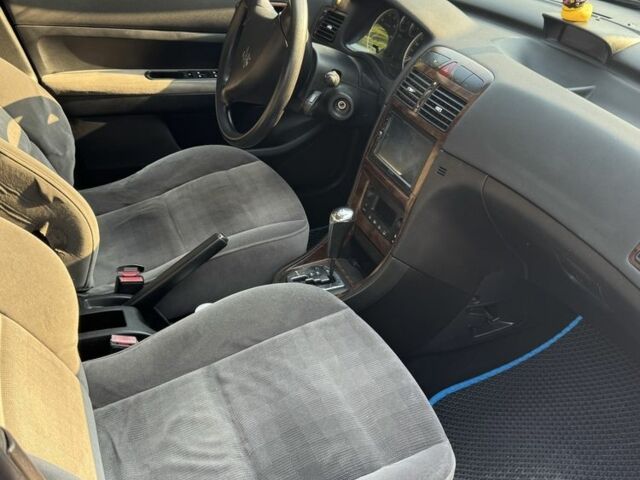 Синий Пежо 307, объемом двигателя 2 л и пробегом 235 тыс. км за 3900 $, фото 7 на Automoto.ua